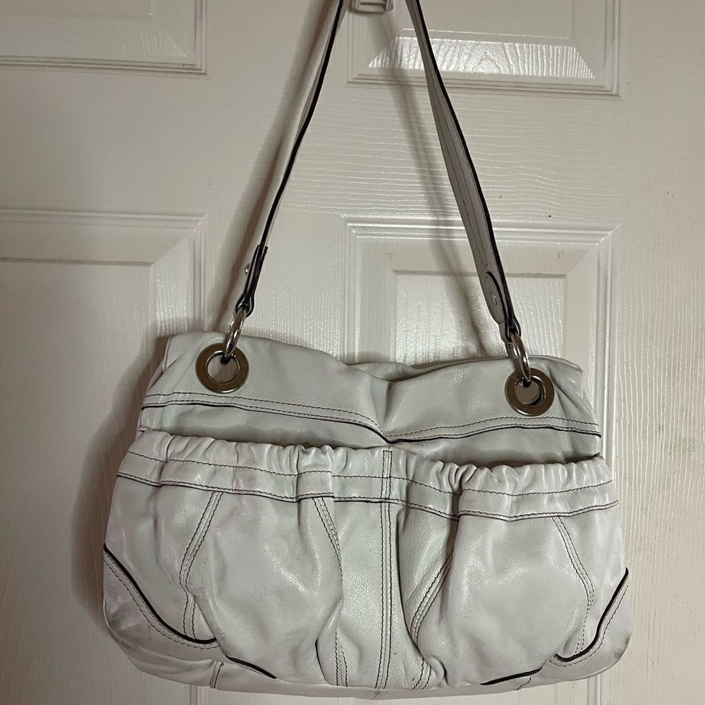 Clarks leather off white shoulder bag with bold silver tone hardwares.